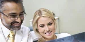 markham dentist showing patient dental X-ray result - Markham dentists by 7 Days Dental