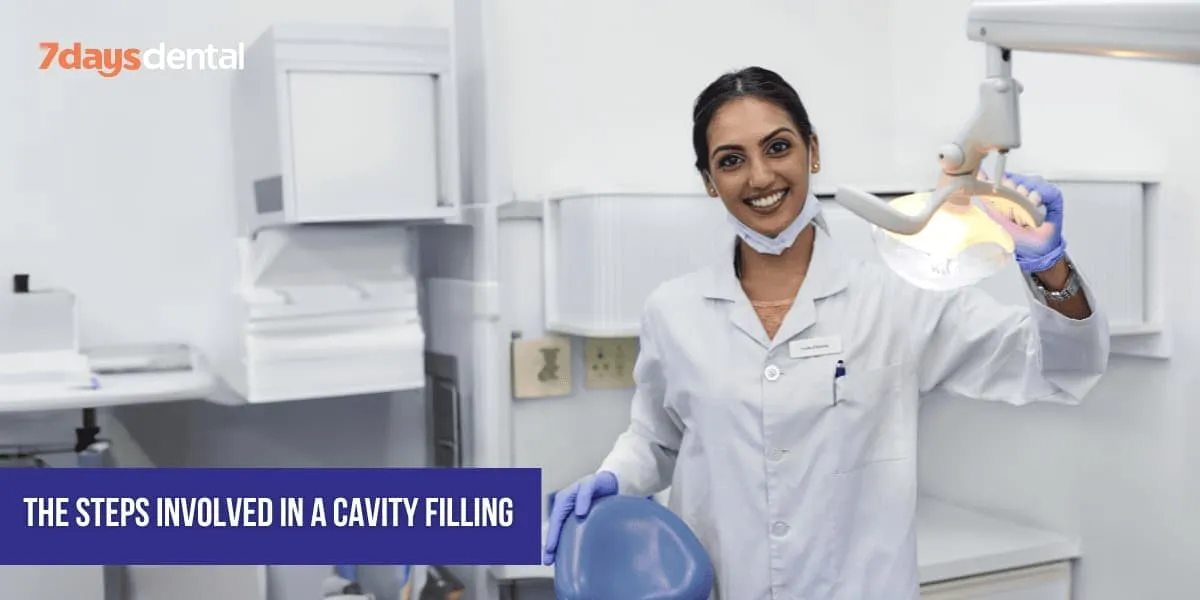 Smiling-dentist-ready-for-your-checkup