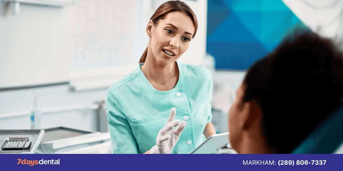 Female-dentist-communicating-with-patient
